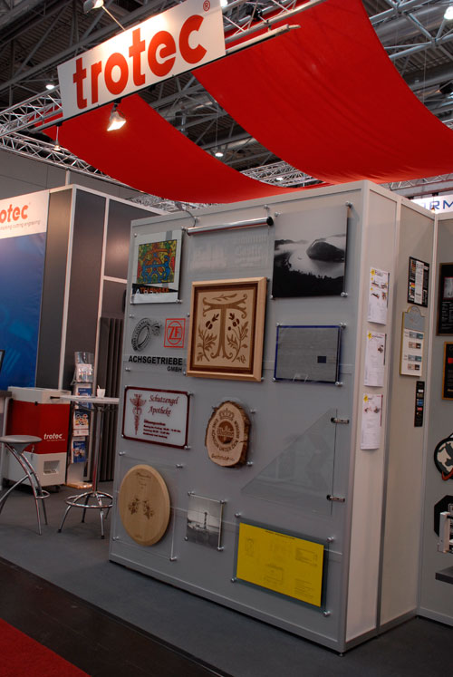 Trotec booth, showing printing examples at Viscom Germany 2007.