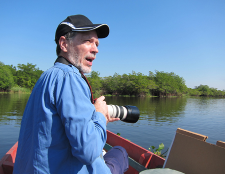 Nicholas photographing birds with a Canon Mark III 